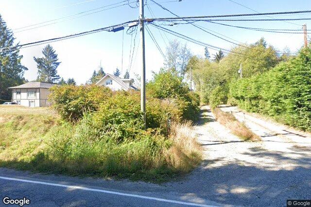 Street view of 1704 Whiffin Spit Rd, Sooke