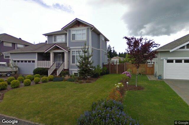 Street view of 2428 Sunriver Way, Sooke