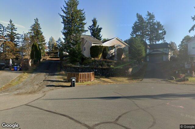 Street view of 668 Charmar Cres, Langford
