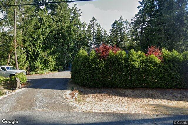 Street view of 812 Woodcreek Dr, North Saanich