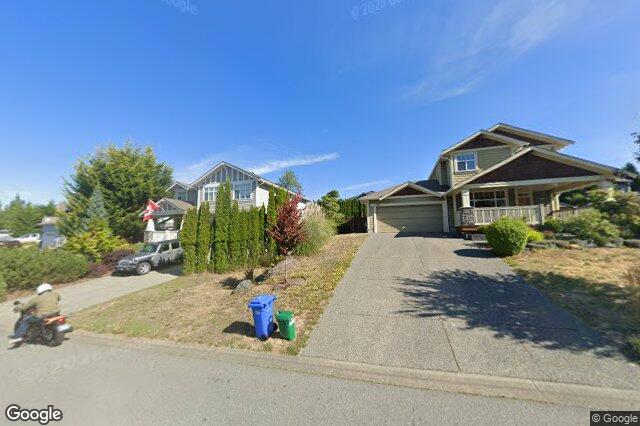 Street view of 2451 Driftwood Dr, Sooke
